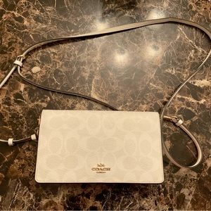 Cute cream and tan coach crossbody purse